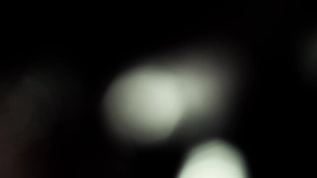 Real Shooted Cinematic Lens Flare Overlay on Black Background at 1000fps Slow Motion.