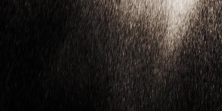 Realistic heavy rain overlay effect with individual raindrops falling vertically on a transparent background, perfect for digital compositing.