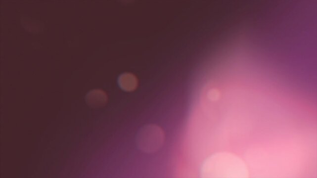 Abstract soft pink and purple light leaks with bokeh particles.