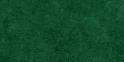 Fototapeta premium Abstract Elegant dark green background with mottled vintage texture in old fancy background design, texture of colored parchment paper. 