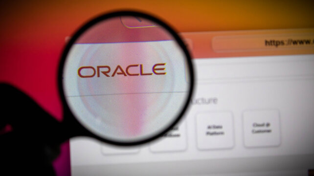 Magnifying glass over the oracle logo on a computer screen