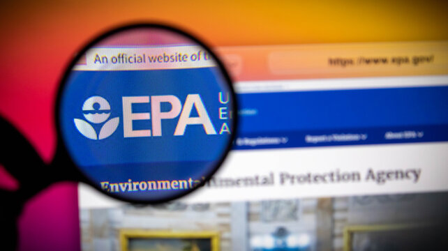 Magnifying glass over the environmental protection agency epa website logo on a computer screen