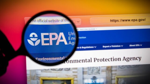 Magnifying glass over the environmental protection agency website on a screen