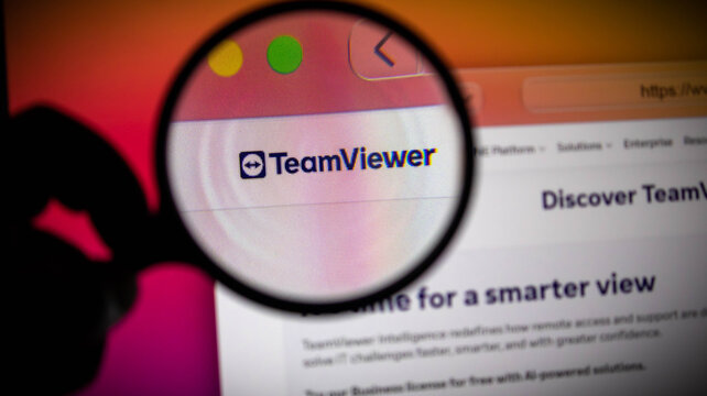 Magnifying glass over the teamviewer logo on a computer screen