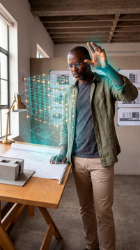 Determined Architect Selecting Holographic Structural Node