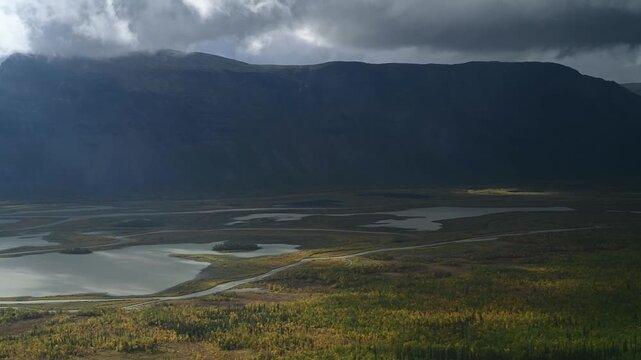 Dramatic Storm Over Rapa River Delta and Autumn Forest in Rapadalen, Sarek National Park Sweden