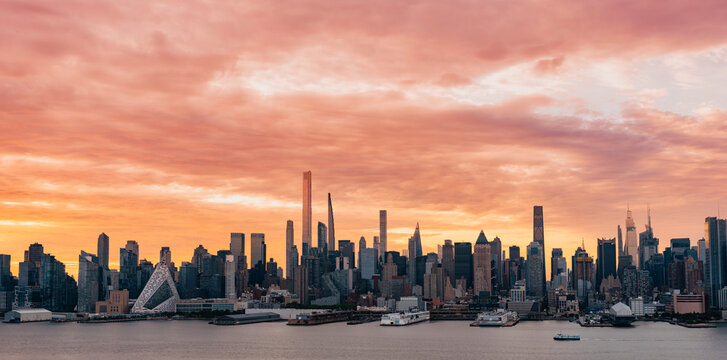 Dramatic Sunrise Over New York City Skyline and Hudson River