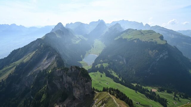 Sweeping Aerial Panorama of Swiss Alps Mountain Ranges and Green Valleys from Hohen Kasten