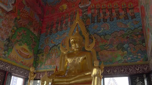 Gilded Buddha Within The Assembly Hall Of Wat Pak Nam Khaem Nu In Chanthaburi, Thailand. Close-up Shot