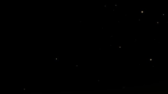 Shining glitter trail animation with glowing light flare, and twinkling fairy sparkles, shimmer particle motion design background overlay, magic dust glitter tail on a transparent black screen
