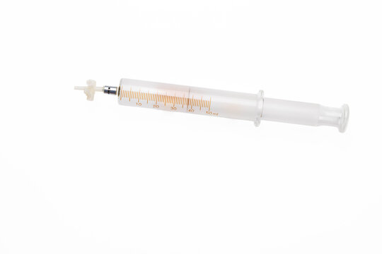 50 ml frosted glass syringe, orange markings, and three-way stop-cock attachment on white background