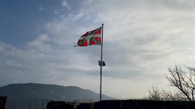 Flag of San Sebasti&aacute;n Spain Basque Country Regional Flag on Windy Day