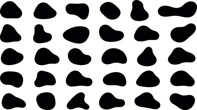 Set of black organic blob shapes and irregular liquid spots