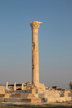 Single ancient Roman marble column in Tripolis ad Maeandrum ancient city, Denizli, Turkey.