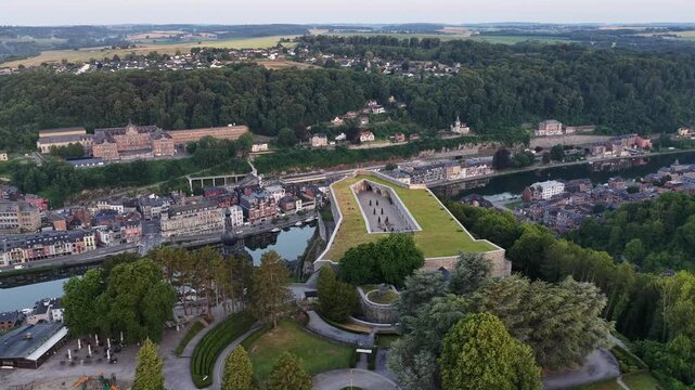 Dinant city and Citadel overlook Meuse River from Ardennes in Belgium