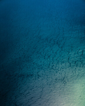 Aerial view of deep blue ocean waters with subtle surface ripples and light reflecting on the waves in Nairobi, Nairobi County, Kenya.