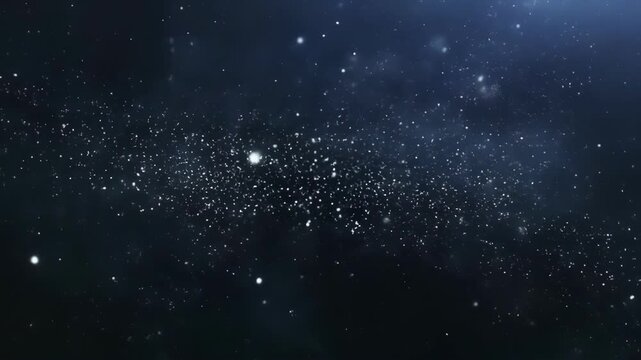 Numerous bright white particles scattered across a dark space-like background