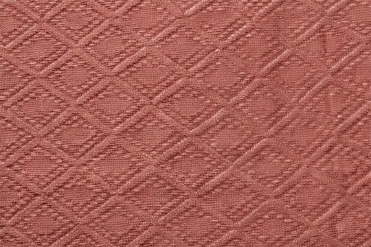 Close up of pink quilted fabric texture