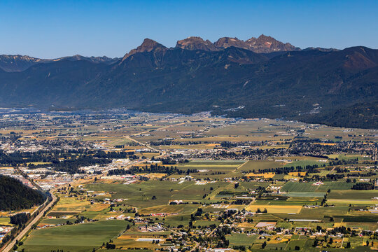 lush farmland in a mountain valley