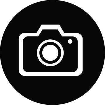 A white camera inside a solid black circle, representing digital imaging, or a media capture button on a white background