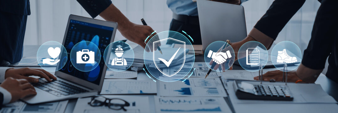 Collaborative Business Meeting with Technology and Data Analysis in Modern Office Setting Featuring Diverse Professionals Engaging in Strategic Planning. Glyphic.