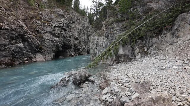 Johnston Canyon Rocky Gorge with Turquoise Water and Overhanging Limestone Walls, Banff National Park