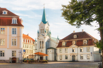 Fototapeta premium Enduring faith- St. Saviour Anglican Church remains a lasting spiritual landmark in Riga Old Town. For religious heritage, architecture and cultural publications.
