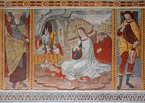 Nativit&agrave; tra i Santi Antonio Abate e Rocco; affresco di Pietro da Cemmo nella chiesa di Santa Maria Assunta a Esine (Brescia)