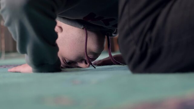Muslim praying prostration mosque