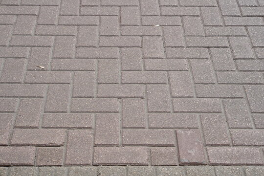 Close-up Texture of Patterned Paving Stones on Old Arbat Street, Moscow