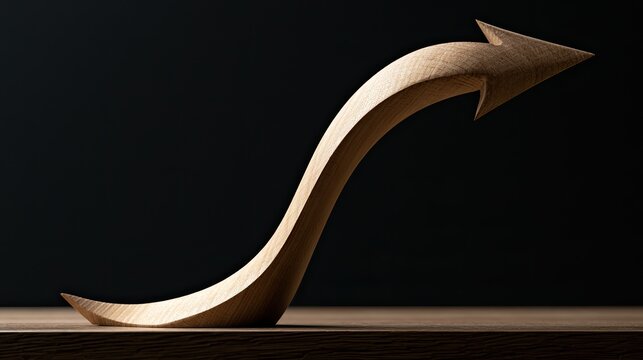 Smooth wooden arrow curves upward against dark background, symbolizing growth