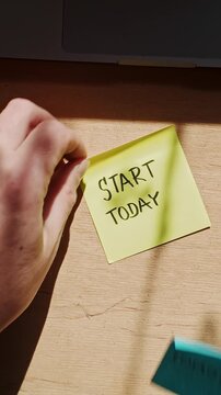 Rapid swapping between &ldquo;start today&rdquo; and &ldquo;tomorrow&rdquo; notes visualizes procrastination, hesitation, and the struggle between action and delay in everyday decision-making.