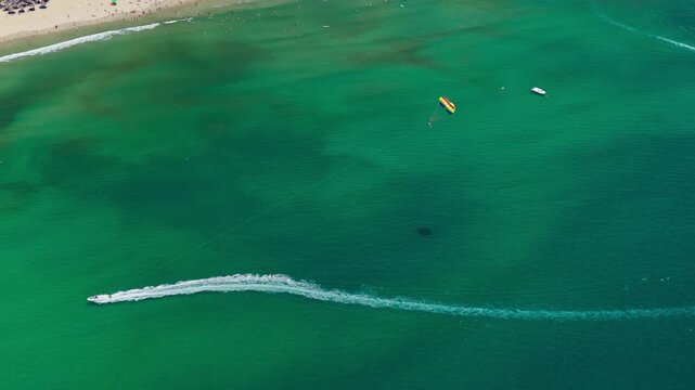 People Parasailing In The Sea Of ​​Da Nang In Vietnam - Drone Shot