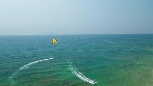 Parasailing Over Sea In Da Nang,Vietnam - Aerial Drone Shot