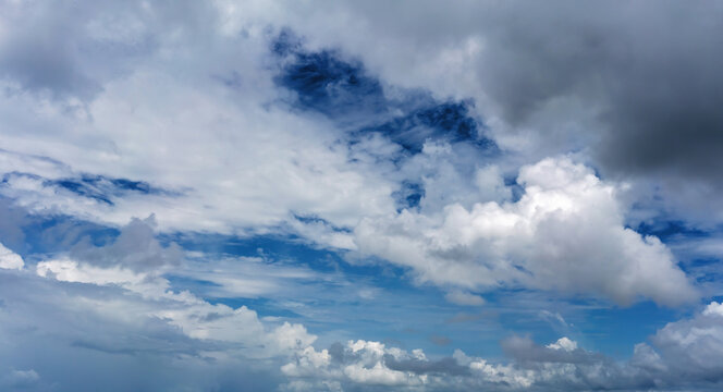 Blue sky and cloud backgrounds with dramatic cumulus and cirrus formations, perfect for replacing skies, replacing photo backgrounds, compositing, photo editing, design and creative projects.