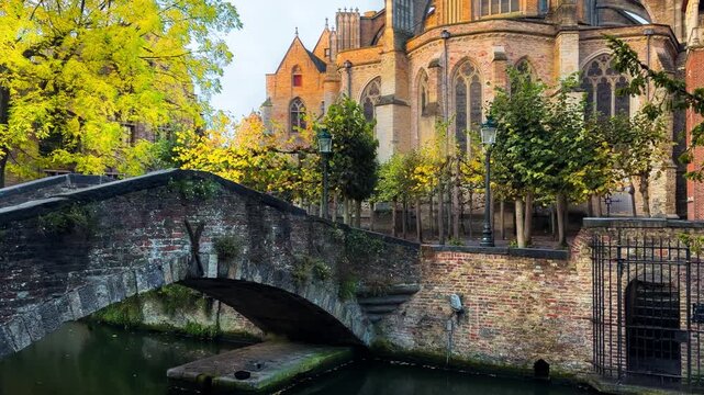 Medieval architecture on the autumn streets of historic center of Bruges, Belgium, October 20, 2025. High quality 4k footage