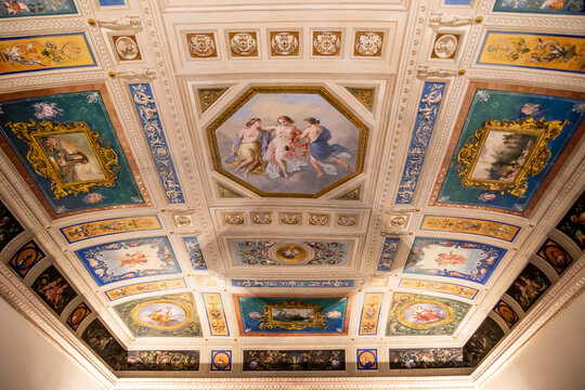 Painted religious frescoes on a Baroque church ceiling, Palermo