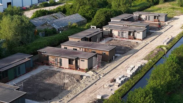 Aerial drone view of temporary modular housing, providing flexible accommodation for refugees, migrant workers and people affected by housing shortages.
