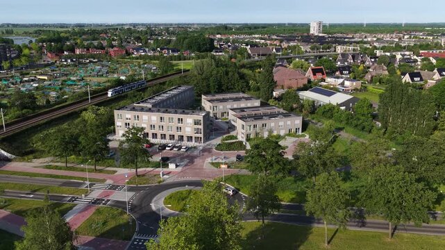 Aerial drone view of prefabricated modular housing, showing temporary homes, off-site construction, transportable units and flexible residential development.