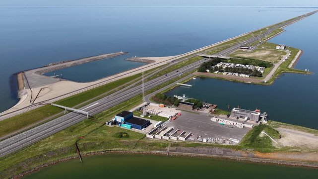 Aerial drone view of the Blue Energy pilot project at Breezanddijk, generating electricity from fresh and salt water at the Afsluitdijk in the Netherlands.