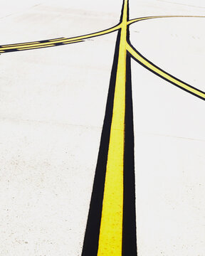 Yellow and black lines on a runway