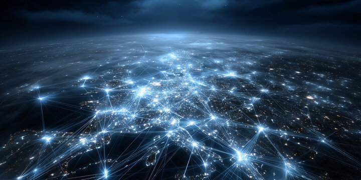 Futuristic view of a connected world at night showcasing financial inclusion and fintech innovations with network connections illuminating the globe
