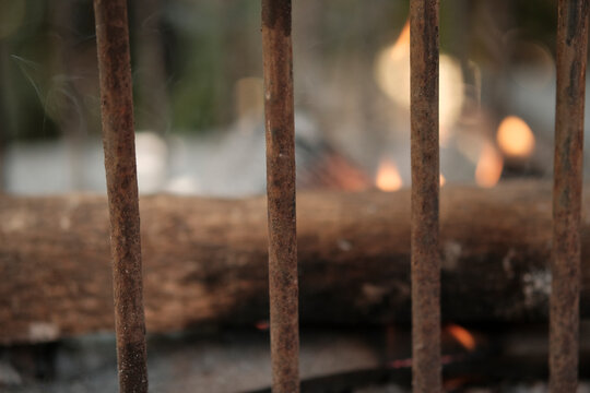 rusty iron grill starting fire