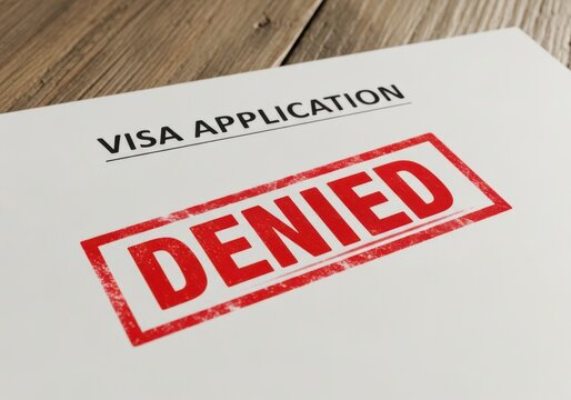 Denied visa application form with red stamp