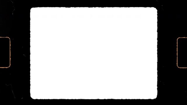 8mm movie film frame with empty white rectangle for projection screen, suitable for film industry projects, background textures, and design elements.