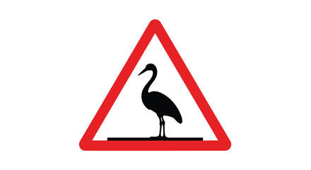 Obraz premium Warning traffic sign featuring a silhouette of a crane or heron bird inside a red triangle for wildlife awareness.