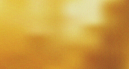 Fototapeta premium A beautiful abstract golden yellow gradient with a subtle grain texture creating a luminous and warm feel for creative designs