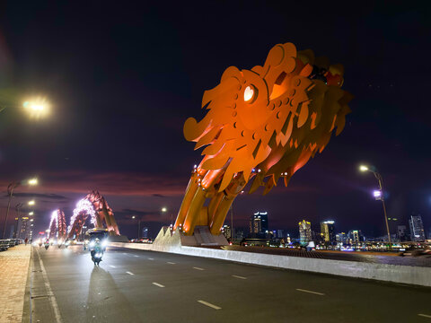 Da Nang, Vietnam - January 18, 2026: Dragon Bridge Dragon Head Close Up at Night with City Skyline