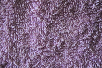 Detailed background texture of violet cotton towel fabric weave pattern. © Roemah feyza images 