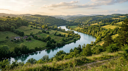 Fototapeta premium Winding River Through Green Countryside Valley